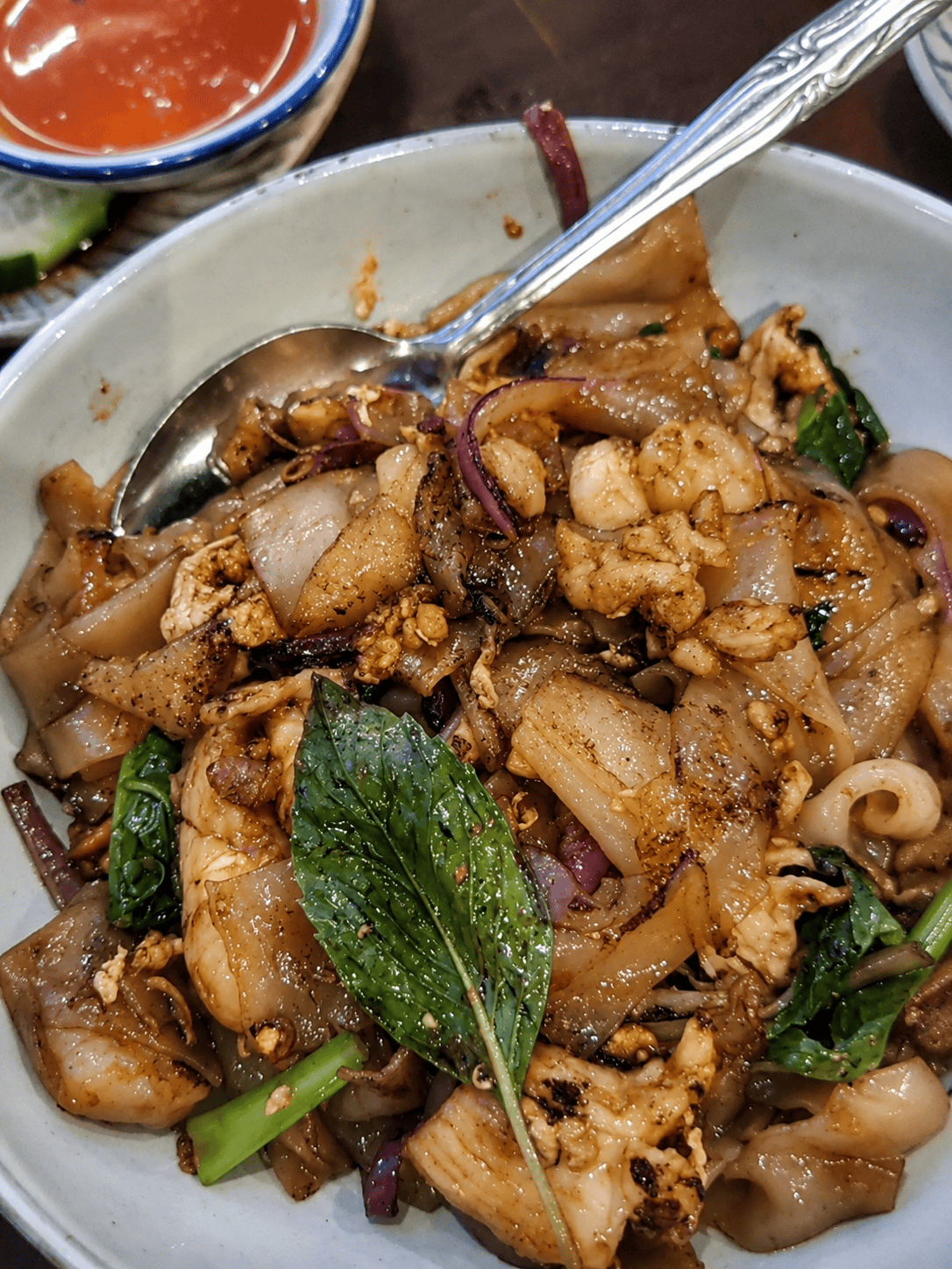 Authentic Malaysian Pinang Char Kway Teow stir fried flat rice noodles with shrimp, bean sprouts, and dark soy sauce.