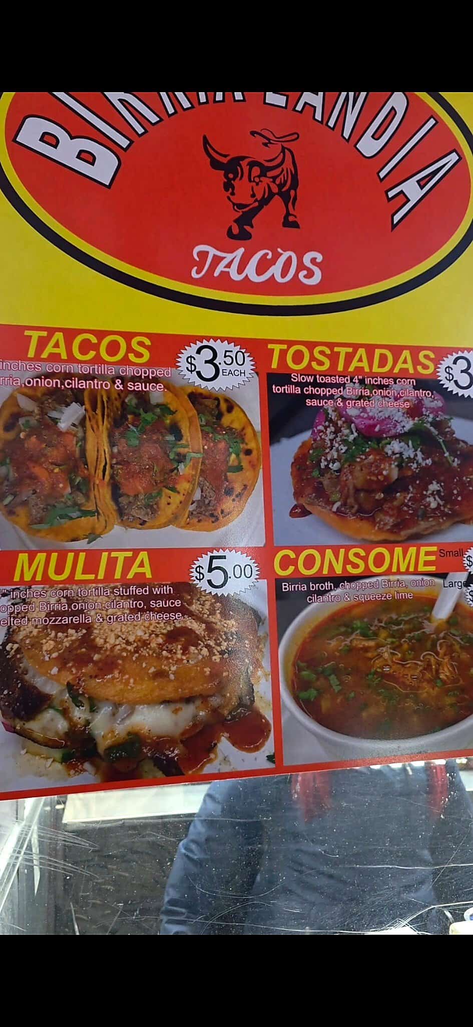 he official Birria-Landia food truck menu showing prices and pictures for Tacos, Tostadas, Mulitas, and Consome.