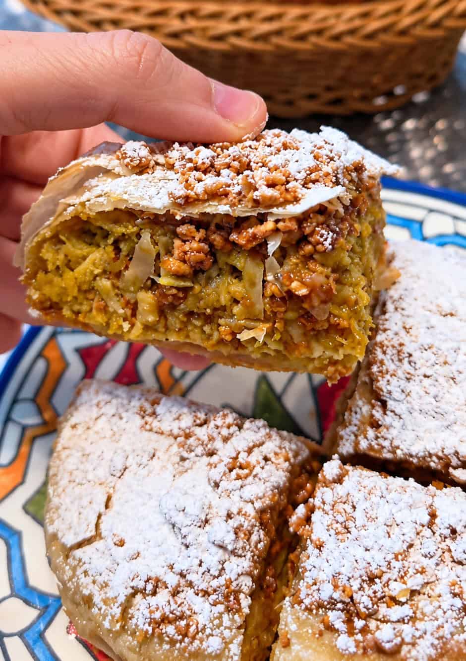 Inside of Chicken Pastilla with chicken filling and flaky pastry at Moroccan Bites by Siham