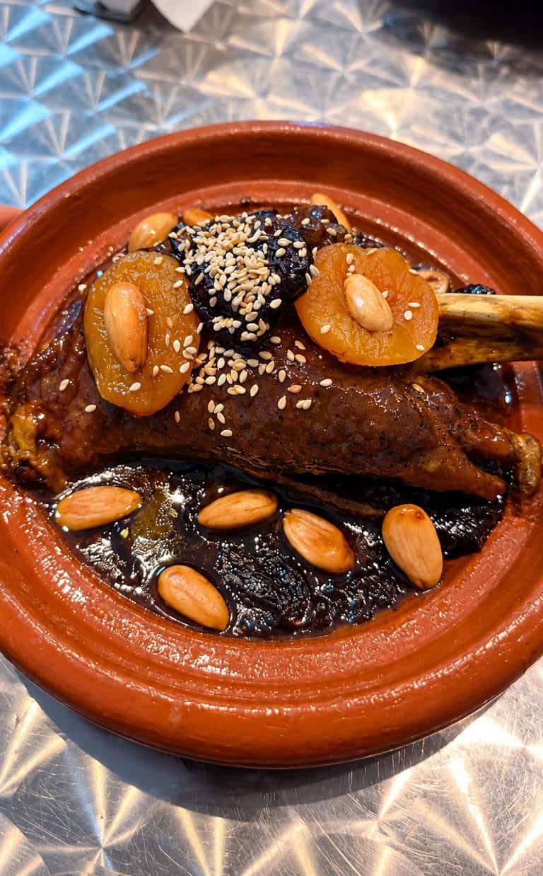 Moroccan lamb with prunes, apricots, almonds and sesame seeds at Moroccan Bites by Siham