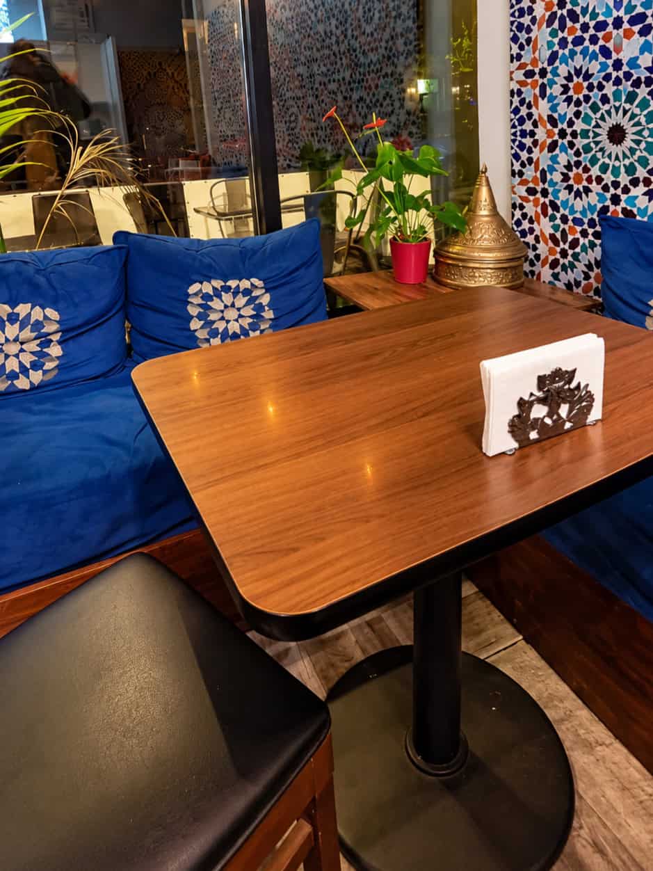 Moroccan-style interior and seating at Moroccan Bites by Siham in Astoria