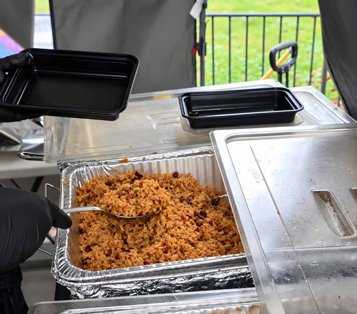 Large tray of freshly prepared Jamaican rice and kidney beans